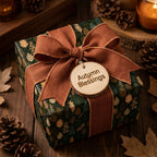 Fall forest green wrapping paper with rustic orange bow and wood tag by Wrapped Studios.