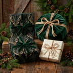 Woodland deer Christmas wrapping paper with green velvet ribbon on rustic holiday gifts by Wrapped Studios.