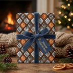 Luxury Christmas wrapping paper in a rustic geometric pattern with blue velvet ribbon by Wrapped Studios.