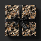 Elegant heart wrapping paper by Wrapped Studios with black ribbon, perfect for Valentine's Day gifts.