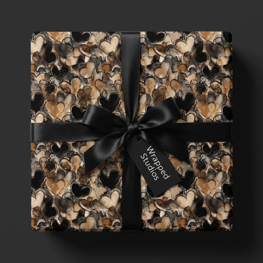Elegant heart wrapping paper by Wrapped Studios with black ribbon, perfect for Valentine's Day gifts.
