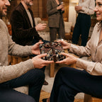 Gift exchange with brown floral wrapping paper and ribbon at Wrapped Studios.