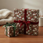 Gifts wrapped in modern, rustic wrapping paper with red & green velvet ribbon.