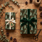 Rustic pine tree Christmas gift wrap on presents with green velvet ribbon by Wrapped Studios.