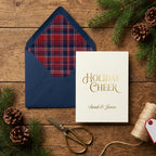 Gold foil Holiday Cheer Christmas card and plaid envelope liner on rustic wood by Wrapped Studios.