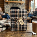 Rustic plaid wrapping paper with a twine bow and Dad gift tag by Wrapped Studios. Cozy Father's Day gift wrap.