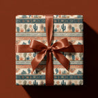 Southwestern cactus wrapping paper with a terracotta satin bow by Wrapped Studios.