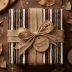 Rustic striped wrapping paper with a burlap bow and Wrapped Studios gift tag.