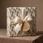 Luxury neutral wrapping paper with cream satin bow and 'For You' tag, by Wrapped Studios.