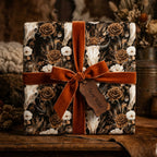 Western gothic wrapping paper with skull floral pattern and rust velvet bow, by Wrapped Studios.