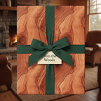 Rustic woodgrain wrapping paper with a green ribbon bow, perfect for nature-themed gifts.
