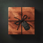 Square gift box in woodgrain wrapping paper with black twine bow and "For Him" tag.