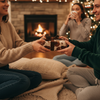 Cozy Christmas scene: People exchanging gifts wrapped in cow print paper with brown ribbon.
