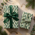 Evergreen tree Christmas wrapping paper with green satin and velvet ribbons by Wrapped Studios.
