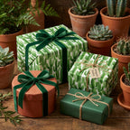 Cactus wrapping paper and rustic gift wrap from Wrapped Studios, styled with green velvet ribbon and twine.