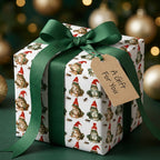Cute frog Christmas wrapping paper with a green ribbon and gift tag by Wrapped Studios.