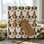 Whimsical frog Christmas gift wrap with Santa hats, tied with a rustic twine bow and Cheers tag by Wrapped Studios.