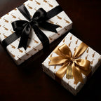 Gold saxophone music wrapping paper with elegant satin bows on gift boxes by Wrapped Studios.