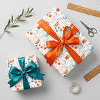 Science wrapping paper with chemistry flasks and molecules, tied with satin bows by Wrapped Studios.