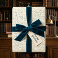 Luxury graduation wrapping paper with math equations and teal velvet bow by Wrapped Studios.