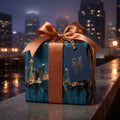 Seattle city skyline wrapping paper with a copper satin bow on a gift box. Luxury gift wrap by Wrapped Studios.