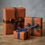 Elegant brown gift boxes wrapped with ribbons for birthdays, holidays, or unique occasion present wrapping.
