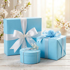 Light blue gift boxes wrapped in white ribbon for baby shower or birthday presents.