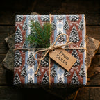 Rustic Christmas gift wrap with vintage tree pattern and From Santa tag by Wrapped Studios.