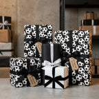 Soccer ball wrapping paper in black and white on sports birthday gift boxes by Wrapped Studios.