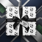 Soccer ball wrapping paper with black satin bow. "Game On!" gift tag.