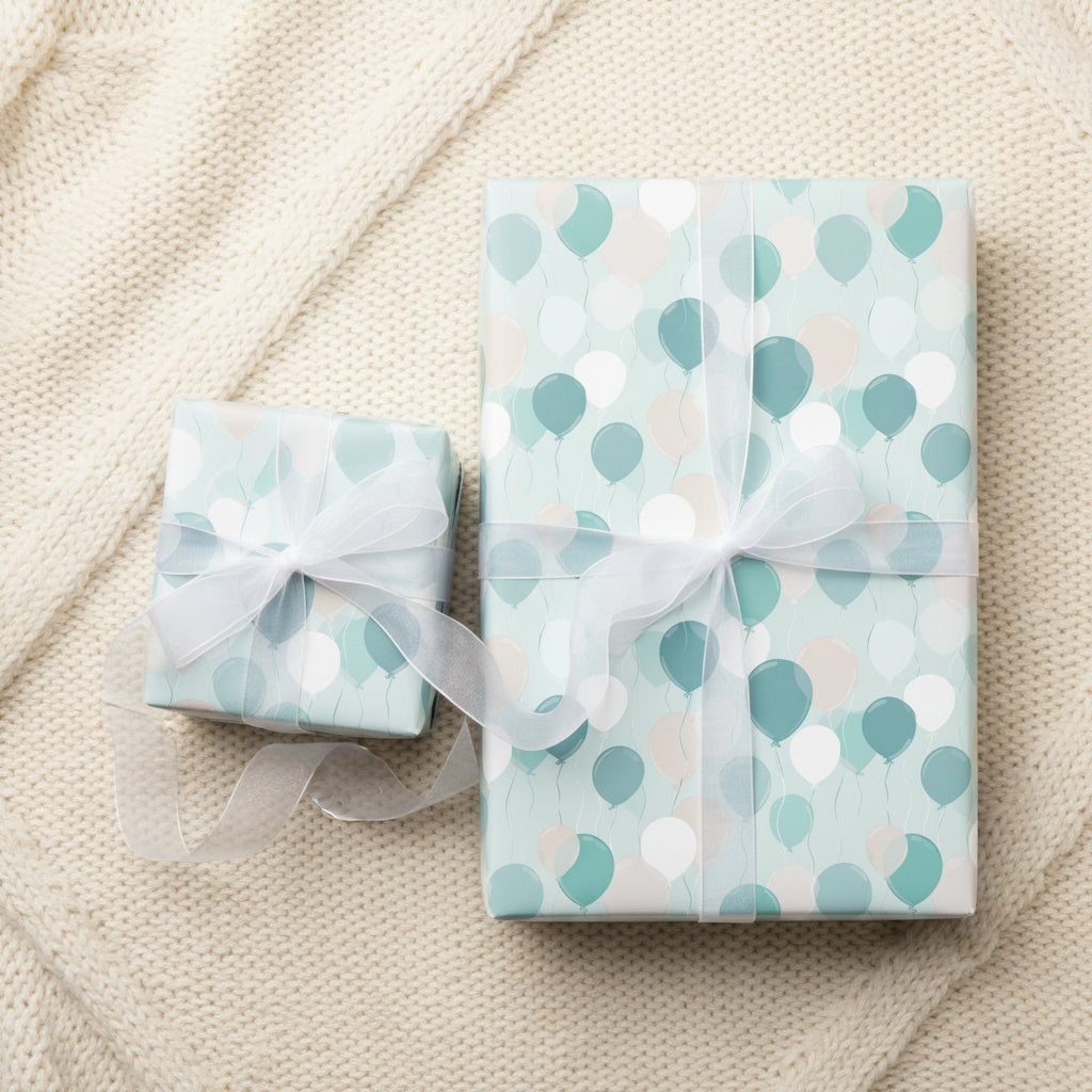Two gifts wrapped in teal balloon wrapping paper with white ribbon, ideal for a birthday celebration.