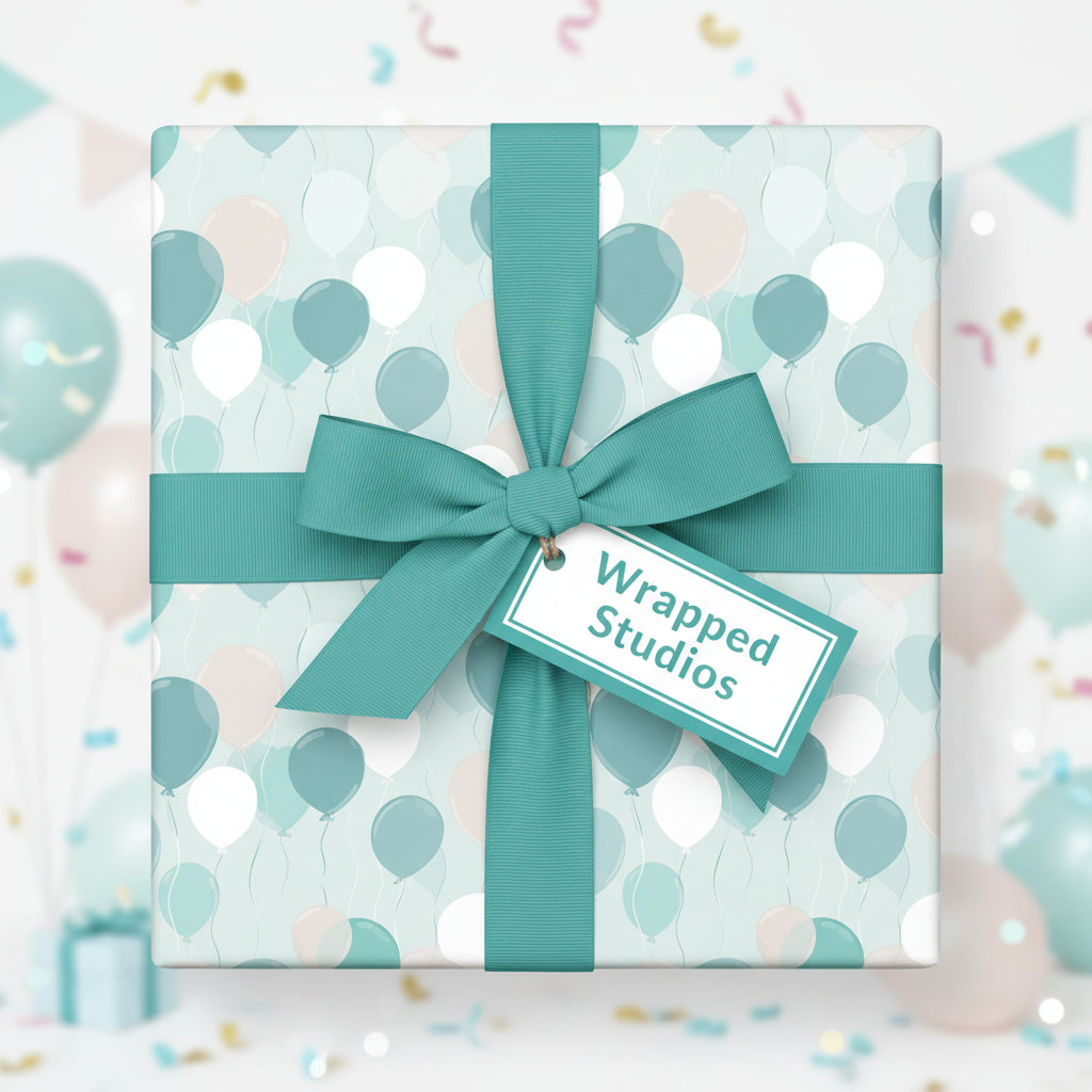 Teal ribbon on a wrapped gift with balloon pattern wrapping paper for birthday presents.