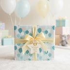 Pastel balloon pattern baby shower wrapping paper with yellow ribbon and "Welcome Little One" tag.