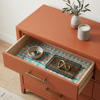 Southwest cactus wrapping paper used as a drawer liner in a modern terracotta dresser by Wrapped Studios.