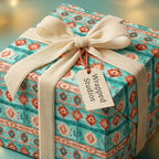 Southwestern boho gift wrap in teal and terracotta with a cream velvet bow by Wrapped Studios.