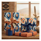 Luxury ikat wrapping paper in blue, orange, and cream with satin ribbons on a rustic wooden table for elegant gift giving.