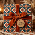 Boho southwestern wrapping paper with orange velvet bow and Warm Wishes gift tag by Wrapped Studios.