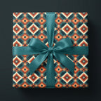Rustic Southwest wrapping paper in teal and orange with a satin ribbon bow by Wrapped Studios.