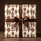Southwest desert cactus wrapping paper with a brown satin bow by Wrapped Studios.