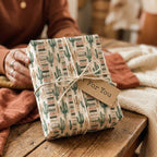 Rustic cactus wrapping paper by Wrapped Studios on a boho gift box with twine and a For You tag.