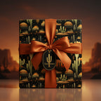 Square gift wrapped in elegant desert cactus wrapping paper with an orange satin ribbon and bow.