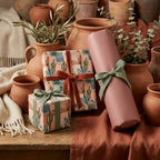 Desert cactus wrapping paper and pink gift wrap with rust velvet ribbon by Wrapped Studios.