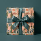 Boho cactus desert wrapping paper by Wrapped Studios, tied with a luxurious teal satin bow.