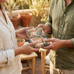 Boho desert wrapping paper with cactus pattern on a gift tied with twine, by Wrapped Studios.