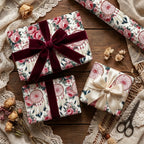Vintage boho floral wrapping paper with pink roses and dreamcatchers by Wrapped Studios, tied with velvet ribbons.