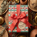 Southwestern wrapping paper in turquoise and terracotta with a coral bow by Wrapped Studios.