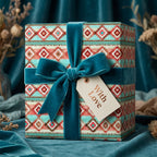 Southwestern boho wrapping paper with a teal velvet ribbon and gift tag by Wrapped Studios.
