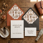 Boho adventure birthday invitation and watercolor tribal envelope liners on rustic wood, by Wrapped Studios.