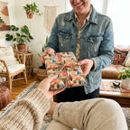Boho desert cactus wrapping paper on a gift tied with rustic twine, by Wrapped Studios.
