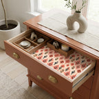 Boho cactus wrapping paper lining a terracotta dresser drawer. Southwest gift wrap by Wrapped Studios.